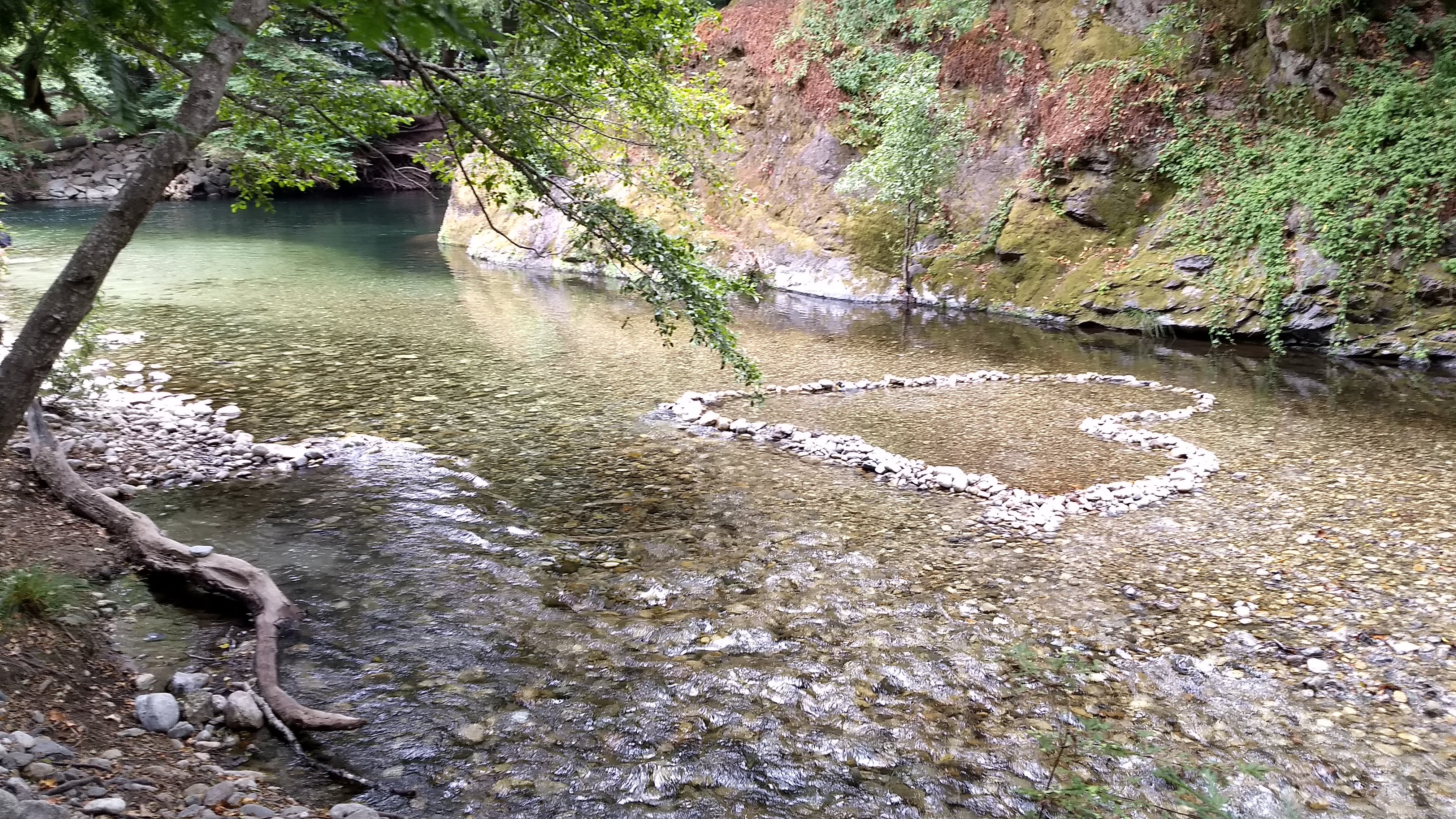 A heart of rocks stacked up in the Big Sur river